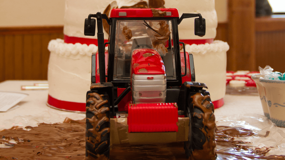 toy tractor on cake